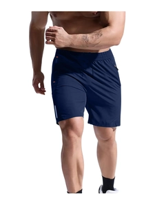 Detail of dark blue sports shorts with zipper pocket and reflective safety strip