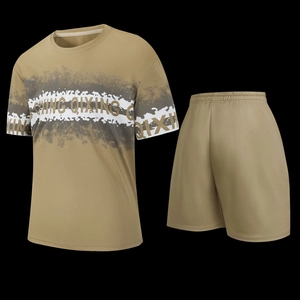 Detail of breathable fabric on men's sport set with letter print and elastic waist