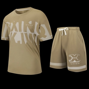 Detail of khaki mesh fabric on men's t-shirt and shorts set with white geometric graphics
