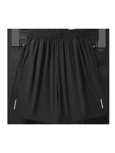Detail of black sports shorts featuring reflective side stripes and orange zipper accents