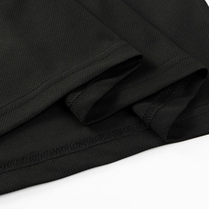 Close-up of black breathable mesh fabric showing precision double-needle hem stitching