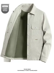 Detail of light khaki jacket featuring waffle texture, metal buttons and chest pocket