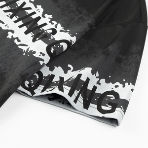 Detail of breathable mesh fabric on black boxing sports set with white flame pattern