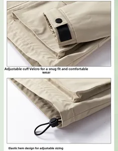 Detail view of adjustable velcro cuffs and drawstring hem system on a beige utility jacket