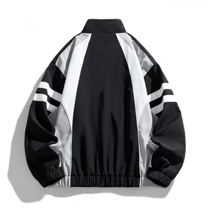 Men's color-block windbreaker jacket with stand collar and geometric panel design