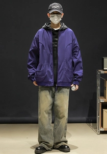Detail view of purple baseball collar jacket with oversized pockets and cargo silhouette
