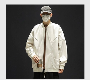 Detailed view of off-white casual jacket with unique curved seams and rib-knit trim