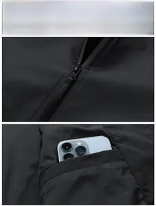 Detail view of water-resistant baseball jacket showing zipper and pocket with phone storage