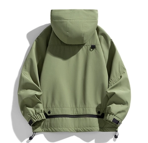 Back view of a water-resistant sage green hooded jacket featuring a tactical D-ring hook