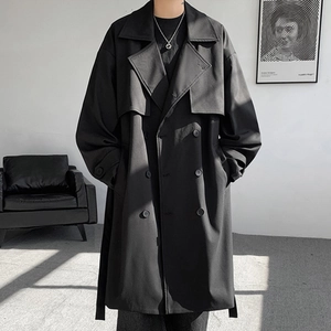 Men's oversized black double-breasted trench coat with lapel collar and shoulder flaps