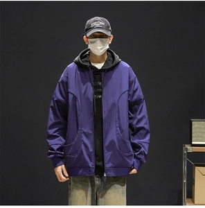 Detail view of purple baseball collar jacket with unique curved front pockets and drop shoulders