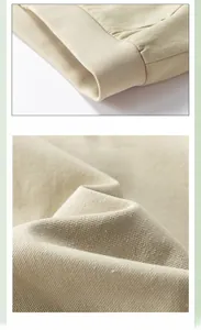 Detail of beige jacket with adjustable ribbed hem and high-quality knit texture fabric