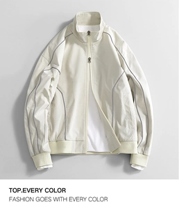 Detail of water-repellent oxford jacket showing elastic cuffs and reflective piping
