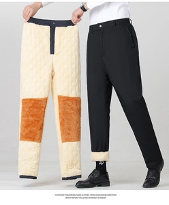 Close-up of men's winter trousers featuring thick fleece lining and orange knee warmers
