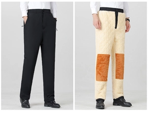 Detail of warm men's trousers with fleece lining and orange thermal knee patches