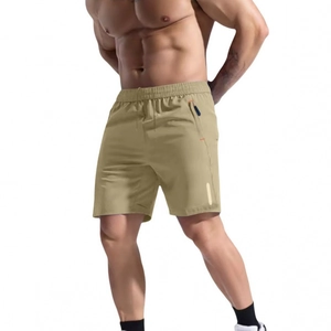 Men's khaki quick-dry athletic shorts with drawstring waist and zipper pockets