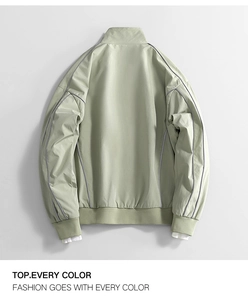 Back view of light green oxford jacket with raglan sleeves and ribbed cuffs details