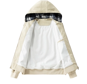 Detail of hooded jacket with plaid lining, inner pocket and premium metal zipper