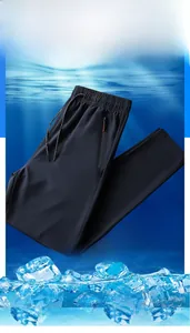 Detail of navy men ice silk pants featuring elastic drawstring waist and side zip pocket