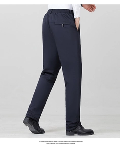 Detail of men's winter thermal trousers featuring an elastic waistband and rear welt pocket