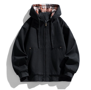 Detail view of men's black hooded jacket with vibrant orange plaid lining and metal zipper
