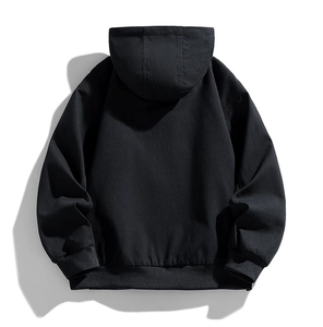 Detailed back view of a black oversized hooded jacket with ribbed cuffs and hem