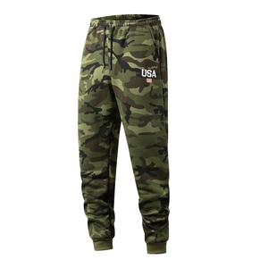 Detail view of camouflage cargo pants featuring USA print, drawstring waist and ribbed cuffs