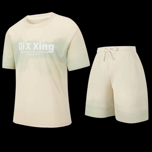 Detail view of breathable mesh sports set with green gradient and drawstring shorts