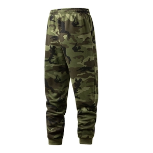 Close-up of camouflage joggers featuring elastic waistband and ribbed cuffs texture