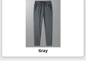 Detail view of grey quick-dry sports trousers featuring elastic waist and zipper pocket