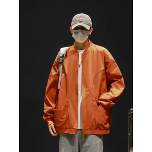 Waterproof orange bomber jacket for men with stylish curved pockets and ribbed collar