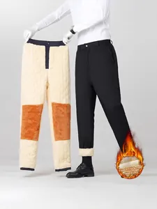 Men's winter fleece-lined trousers in black with warm knee reinforcement and slim fit