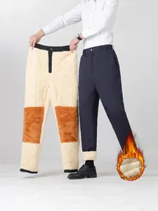 Men's thermal winter pants with thick fleece lining and warm knee padding in navy blue