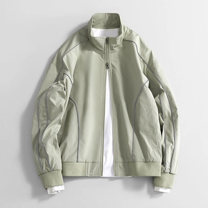 Men's sage green oxford jacket with water-resistant fabric and stylish grey stitching detail