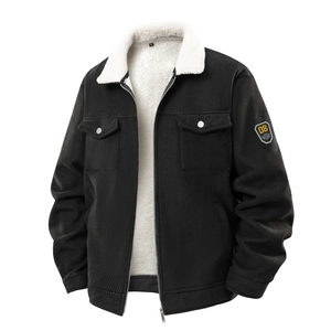 Close-up of corduroy jacket with white fleece collar and embroidered sleeve patch detail
