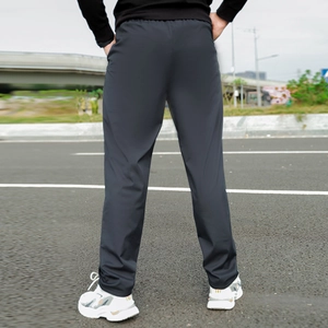 Rear view of men's thick lamb fleece thermal casual pants in charcoal grey
