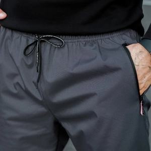 Detail of winter thermal pants featuring elastic waistband with KESPORTS drawstrings