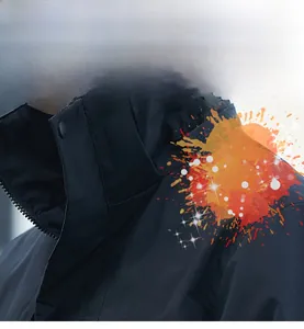 Detail showing stain-resistant and oil-repellent fabric on dark blue outdoor jacket