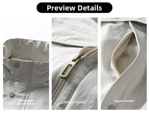 Detail of vintage windproof stand collar and smooth metal zipper on lightweight beige jacket