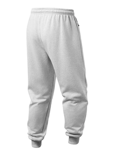 Detail of light grey joggers showing elastic waistband and ribbed cuffs texture