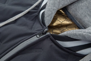 Detail of graphene thermal lining and honeycomb heat-reflective fabric on a winter jacket