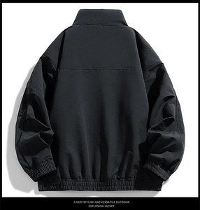 Detail view showing the ribbed cuffs and windproof fabric of this black vintage jacket