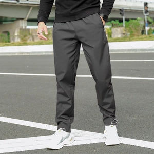 Men's dark gray fleece casual trousers with side zipper pockets and windproof fabric