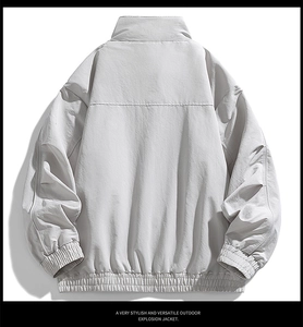 Macro back view of vintage outdoor jacket featuring structured stitching and elastic hem