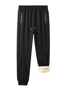 Detail view of winter jogger pants featuring thick fleece lining and zipper pocket