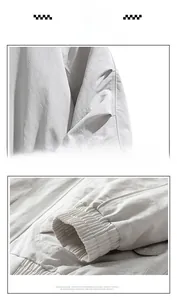 Detail view showing unique pleated stitching on sleeves and elastic cuffs of the jacket