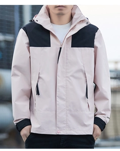 Detail of pink and black color-block hooded jacket with zippered pockets and ribbed cuffs