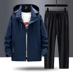 Men's outdoor sports suit with navy hooded windbreaker and black waterproof pants