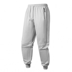 Men's grey fleece-lined sports joggers with drawstring waist and decorative zip pocket