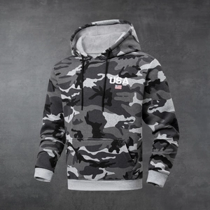 Detail of gray camo hoodie featuring USA embroidery and high-quality kangaroo pocket